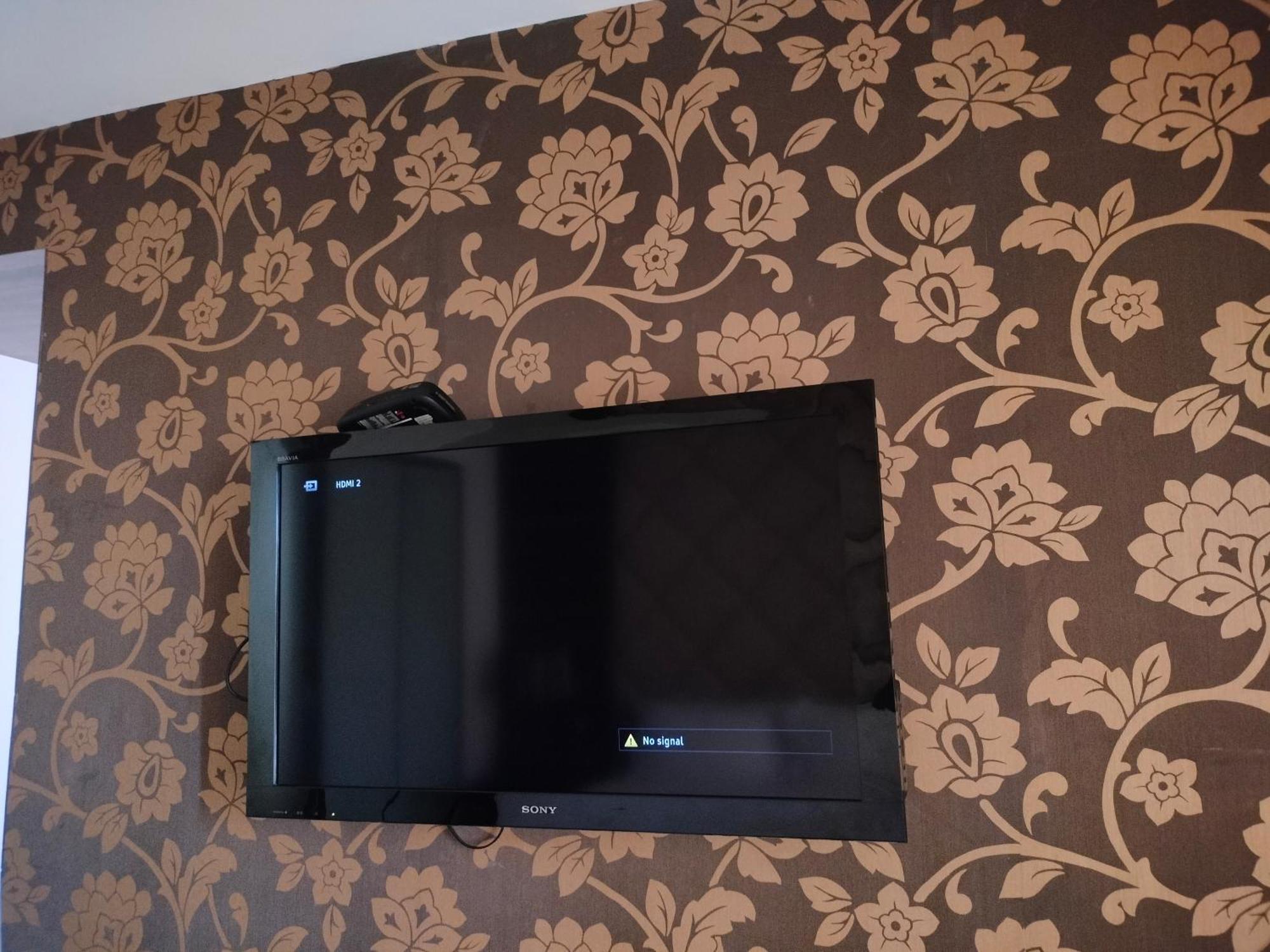 ฮอลิเดย์ อินน์ จันทิครห์ ปัญจกุลา ปัญจ์กุลา ภายนอก รูปภาพ A television mounted on a wall